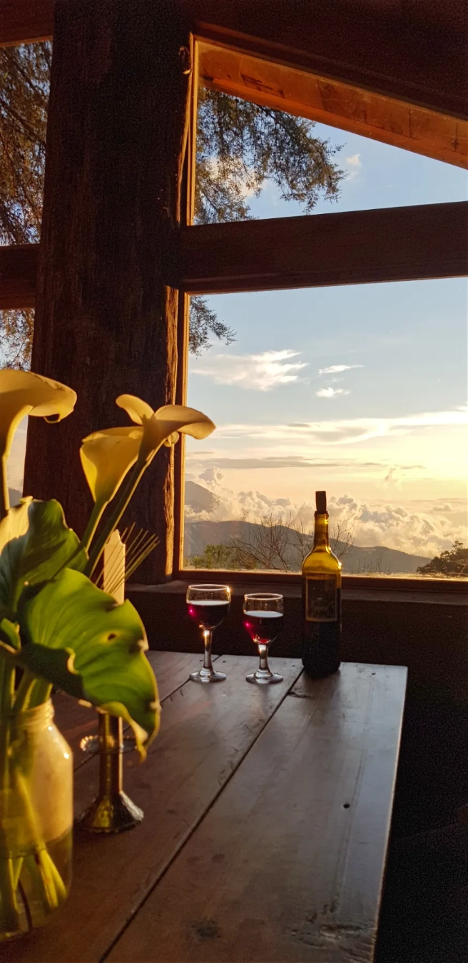 https://tierraventura.com/Dining while enjoying sunset on a cloud ocean at Terrazas de la Tierra in San Jose del Pacifico